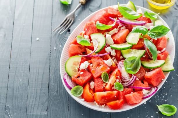 istock Summer salad with watermelon and salad leaves 1153046334