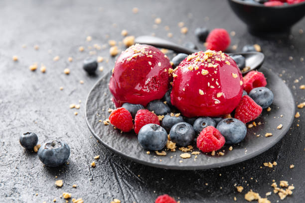 istock Berry refreshing ice cream scoops on plate 1153046335