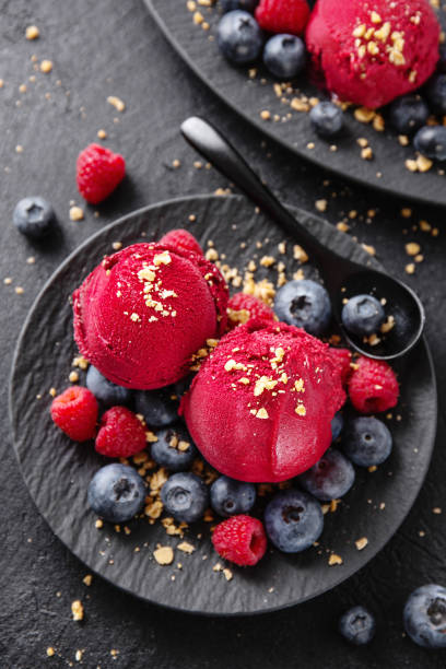 istock Berry refreshing ice cream scoops on plate 1153046406