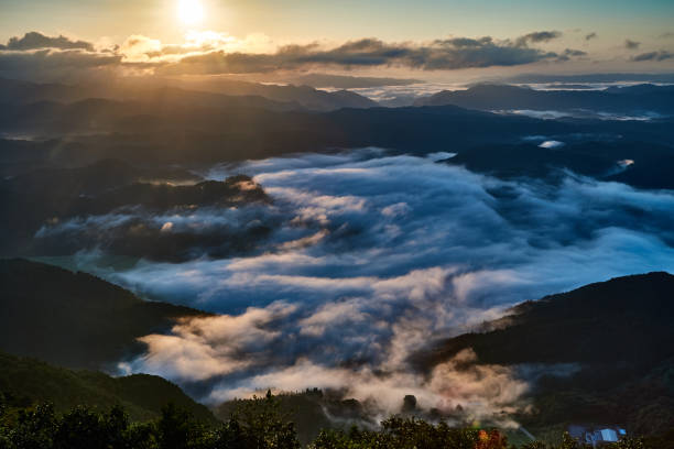 istock Sunrise over the mountain range in Okayama, Japan 1153046499