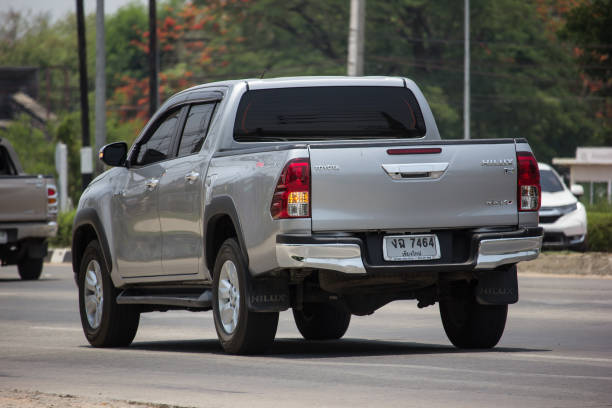 Private Pickup Truck Car Toyota Hilux Revo Chiangmai, Thailand - May 21 2019: Private Pickup Truck Car Toyota Hilux Revo. On road no.1001, 8 km from Chiangmai city. toyota hilux stock pictures, royalty-free photos & images