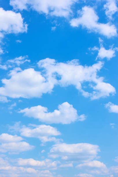 istock Beautyful blue sky with white clouds -  vertical background 1153049922