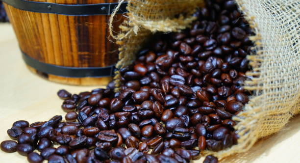 istock Close up of coffee beans background 1153051741