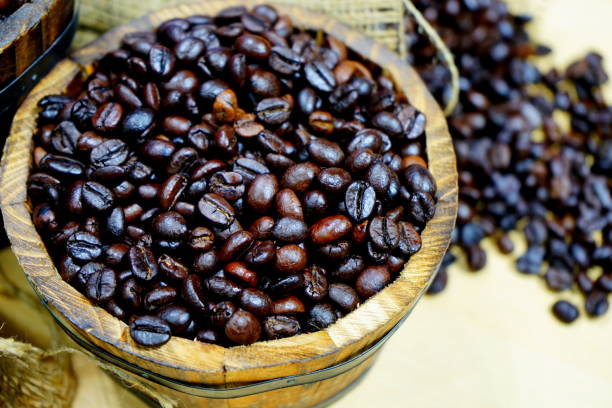 istock Close up of coffee beans background 1153051811