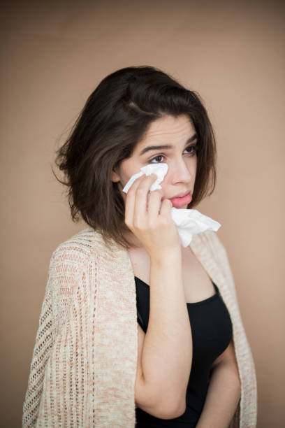 istock Young woman with flu virus symptom. 1153054776