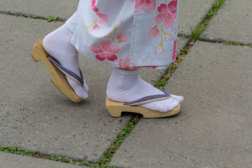 Girl in kimono and zori sandal. Japanese culture