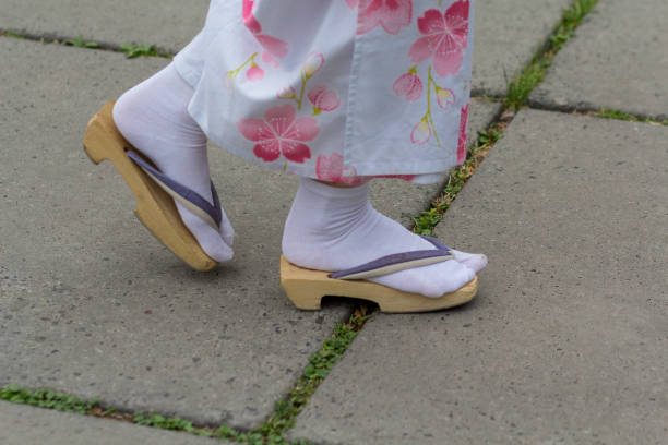 Girl in kimono and zori sandal. Japanese culture Girl in kimono and zori sandal. Japanese culture geta sandal stock pictures, royalty-free photos & images