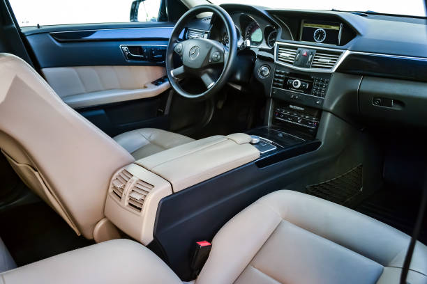 View To The White Interior Of Mercedes Eclass W212 With Dashboard Clock  Media System Front Seats And Shiftgear After Cleaning Before Sale On  Parking Stock Photo - Download Image Now - iStock