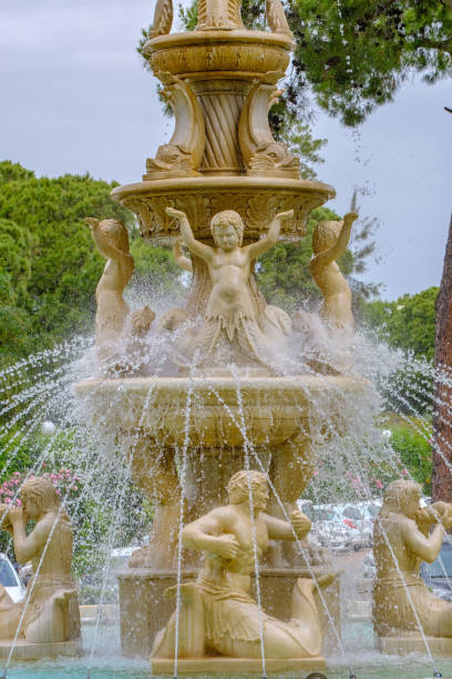 istock Fountain with antique statues in the garden 1153061035