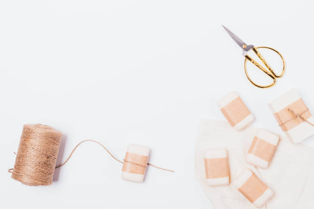 istock Flat lay composition process of packing natural handmade soap 1153061280