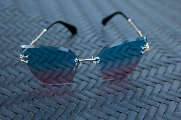istock sunglasses wooden sharp bench background nobody 1153061561
