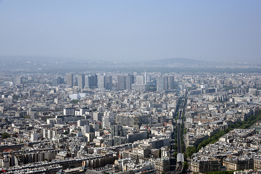 Paris - Panoramic view. The image was captured during springtime from the Montparnasse Tower. Paris is the capital of France and with its 2.1M population one of the largest cities in europe.