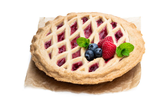 istock Homemade whole forest fruit tart isolated on white 1153068841