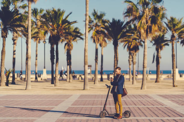 istock Businessman with scooter 1153071343