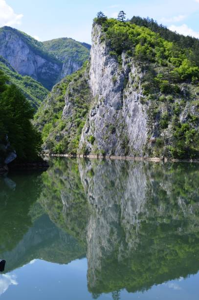 istock Reflection of the stone in the lake 1153073935