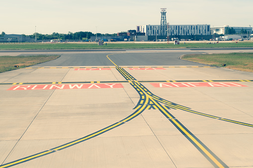 Markings to indicate that a runway is ahead at the end of a taxiway, Dulles International Airport, Dulles, Virginia, United States.
