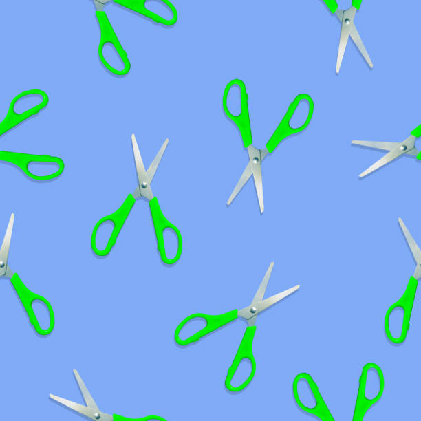istock Seamless pattern of scissors on color background 1153078472