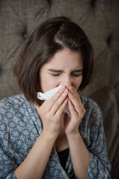 istock Young woman with flu virus and allergy  symptom. 1153081396
