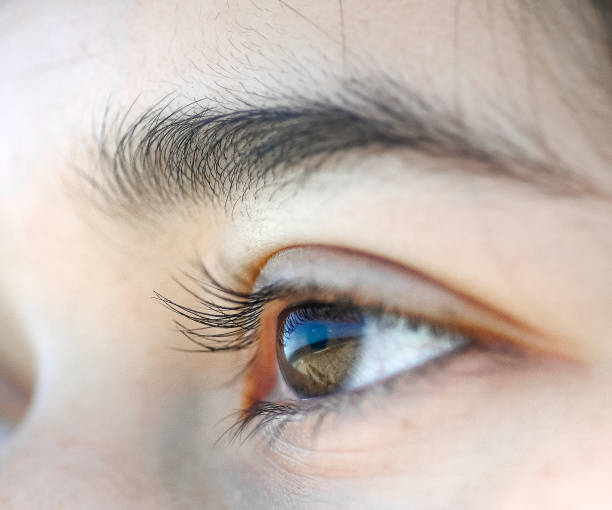 istock Extreme close up of a human eye 1153084111