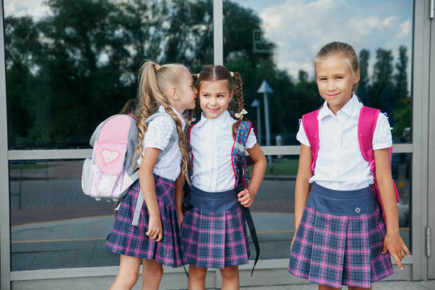 istock Group of kids with backpack going to school together 1153088196