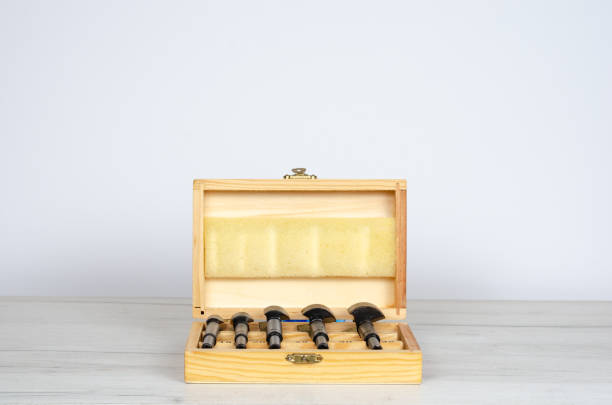 istock Wooden box with  forstner hinge hole boring cutter wood drill bits . 1153088530