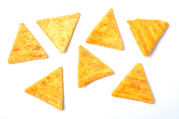 istock nacho chips isolated on white background, unhealthy junk fired food 1153088548