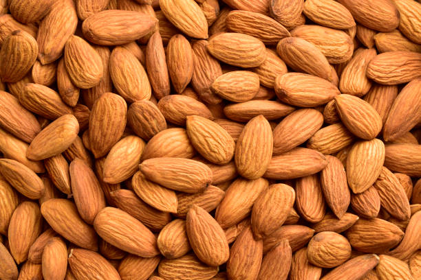Almond, Backgrounds, Nut - Food, Textured, Harvesting stock photo