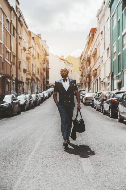 istock African man is going down the street 1153101547