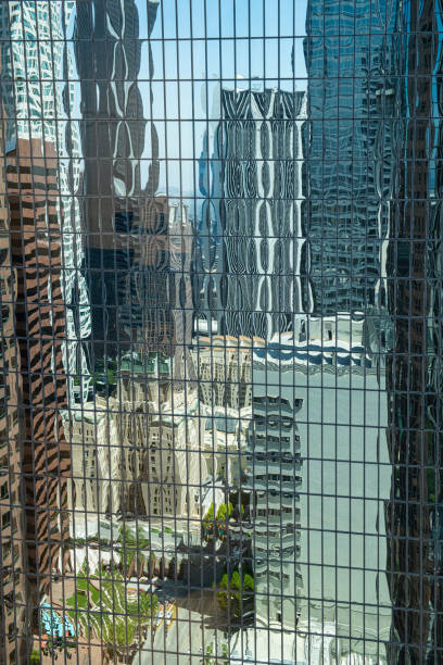 istock Distorted Reflections on a Skyscraper in Downtown Los Angeles 1153102322