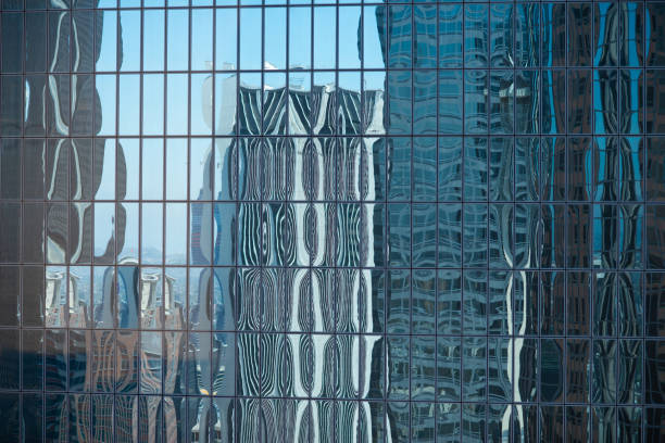 istock Distorted Reflections on a Skyscraper in Downtown Los Angeles 1153102384
