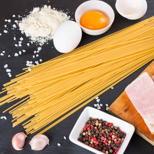 istock Ingredients for italian pasta carbonara. top view. 1153103197