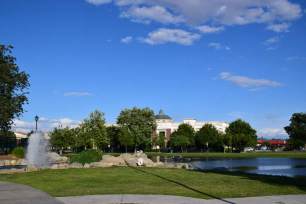 istock White business building at the park. 1153107324