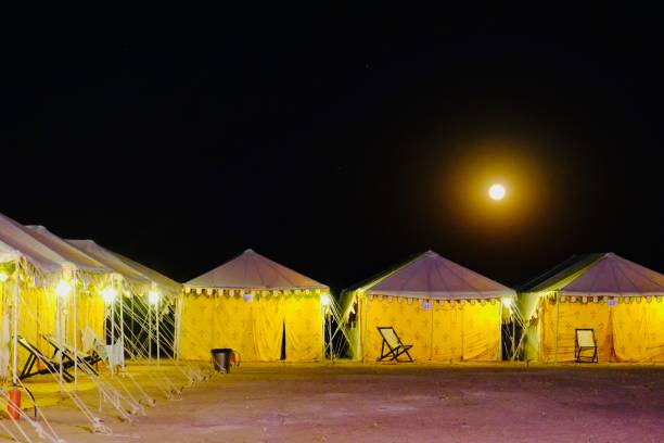 istock Desert campsite illuminated by full moon 1153109488