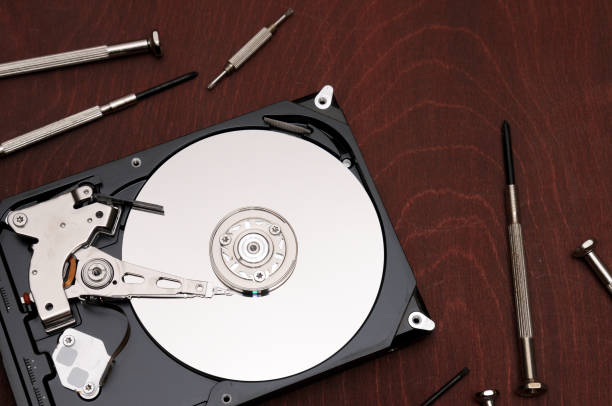 istock Internal hard drive for storing and transferring various files on a white background 1153110704