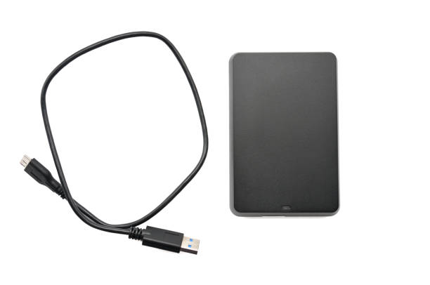 istock External hard drive for storing and transferring various files on a white background 1153112563