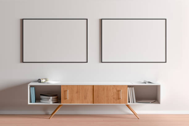 Blank horizontal posters mock up with black frame Two blank horizontal posters mock up with black frame above the cabinet in living room interior. 3d illustration. two objects photos stock pictures, royalty-free photos & images