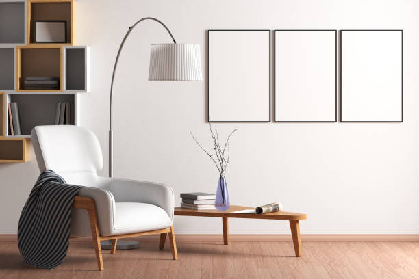 Blank poster mock up with black frame on the wall in living room interior