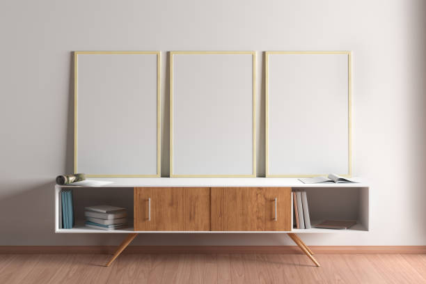 istock Blank vertical posters mock up with wooden frame 1153113326