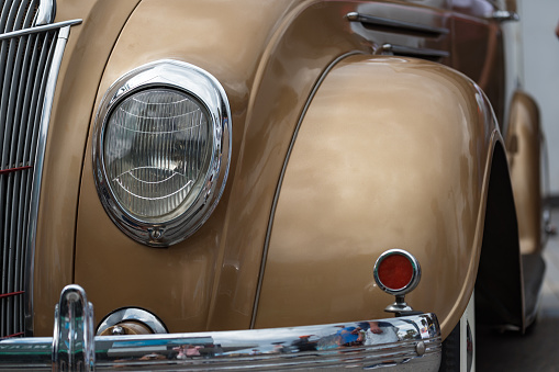 Partiel front view of a classic car from the fifties