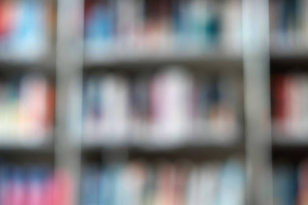istock Blur image of shelf with books in library. Background. 1153118835