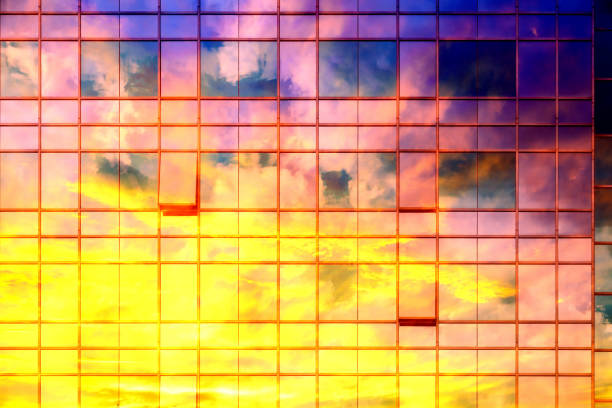 Summer, the sunset after the rain, the clouds against the city buildings