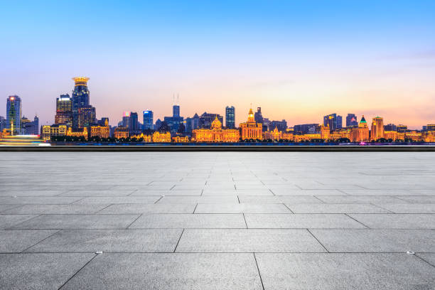 istock Shanghai bund city skyline and empty square floor at night 1153143615