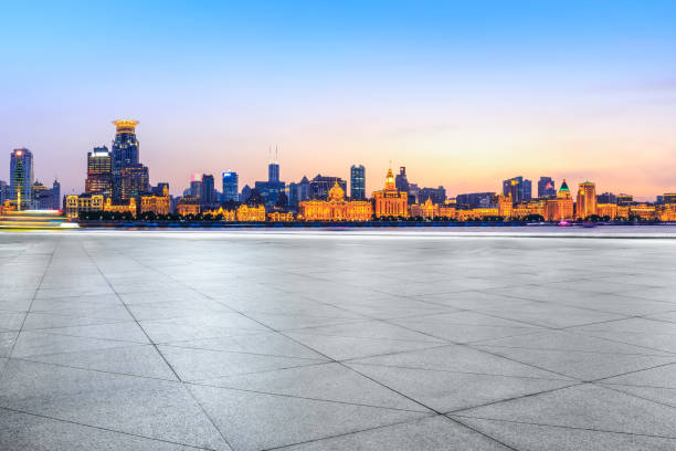 istock Shanghai bund city skyline and empty square floor at night 1153143664