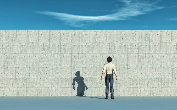 istock Man looking up to the big wall. This is a 3d render illustration. 1153147721