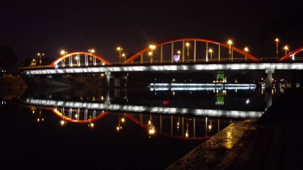 istock Night city with orange lights at summertime 1153148938