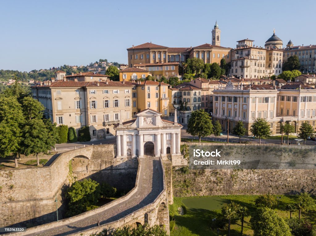 Bergamo, Italy. Drone aerial view of the old gate San Giacomo and historical building. The Old town. One of the beautiful city in Italy Bergamo Stock Photo
