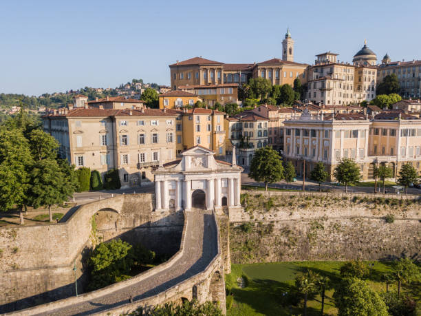 Bergamo, Italy. Drone aerial view of the old gate San Giacomo and historical building. The Old town. One of the beautiful city in Italy stock photo