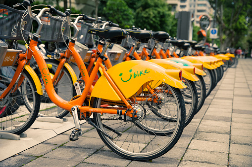 Taipei, Taiwan- May 2019: long row of bicycles for rent in Taipei, Taiwan