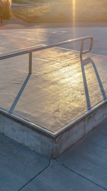 istock Vertical Concrete square platform at a park viewed on a sunny day 1153173067