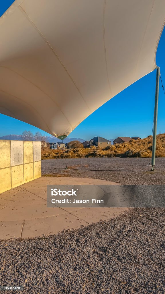 Vertical Concrete Rectangular Structure On A Rocky Ground Under A White ...